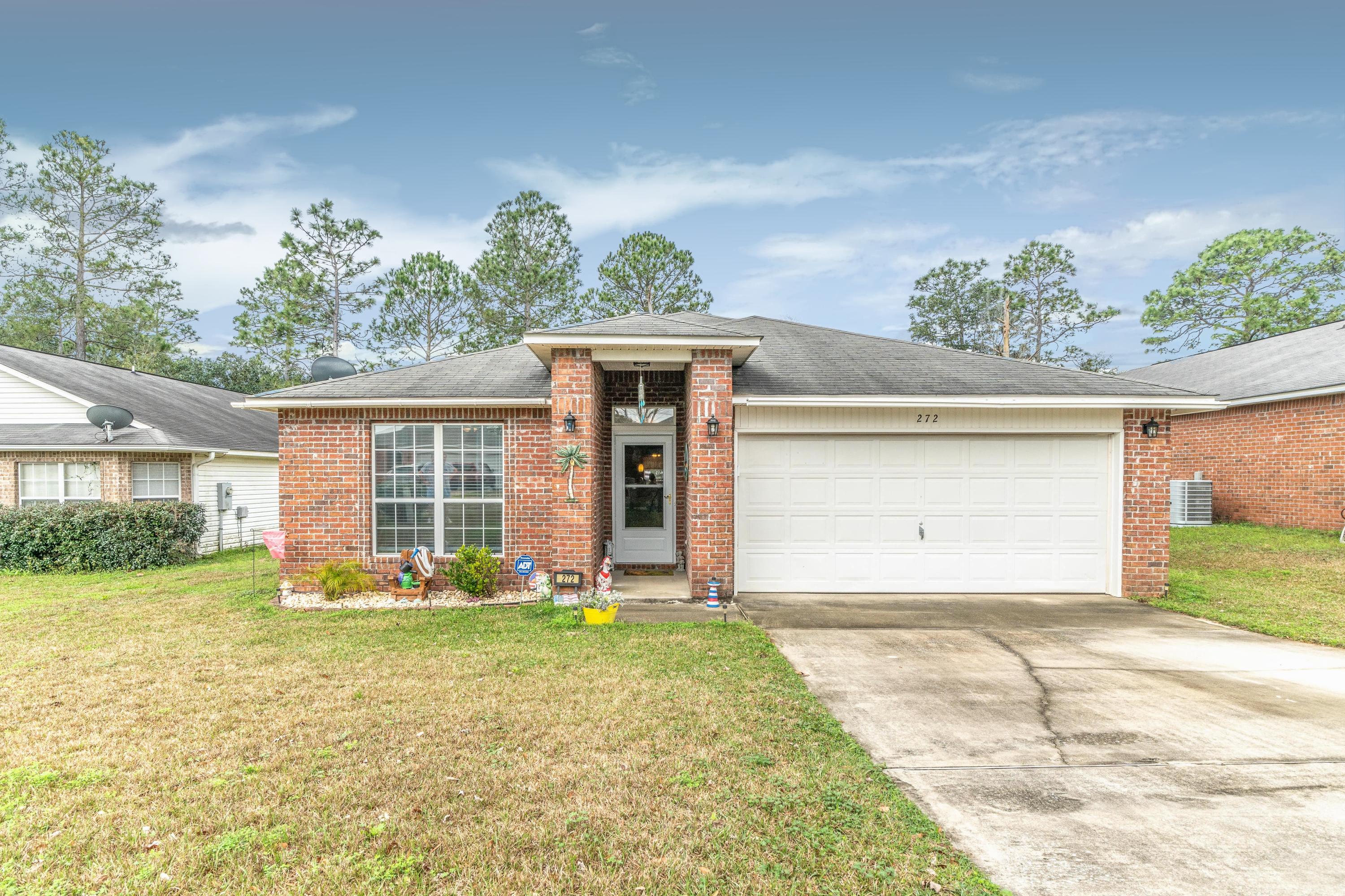 Welcome Home! You will love this beautifully maintained all brick SPACIOUS 3 bedroom 2 bathroom home with a 2 car garage. When you walk into the home you will be welcomed by the HUGE living room with a vaulted ceiling and a media niche. The home is a open concept split floor plan with lots of natural light throughout the home. Enjoy the HUGE kitchen with island, two separate breakfast bars, and pantry. The large master suite offers a large master bath with dual vanities. You will enjoy grilling on the back covered patio and two tier deck. A natural buffer allows for both beauty and privacy. The home has been recently updated with new paint, light fixtures, fans, rain gutters, newer AC and more. Located on the south side of Crestview close to shopping, schools, and bases! Truly a must see!