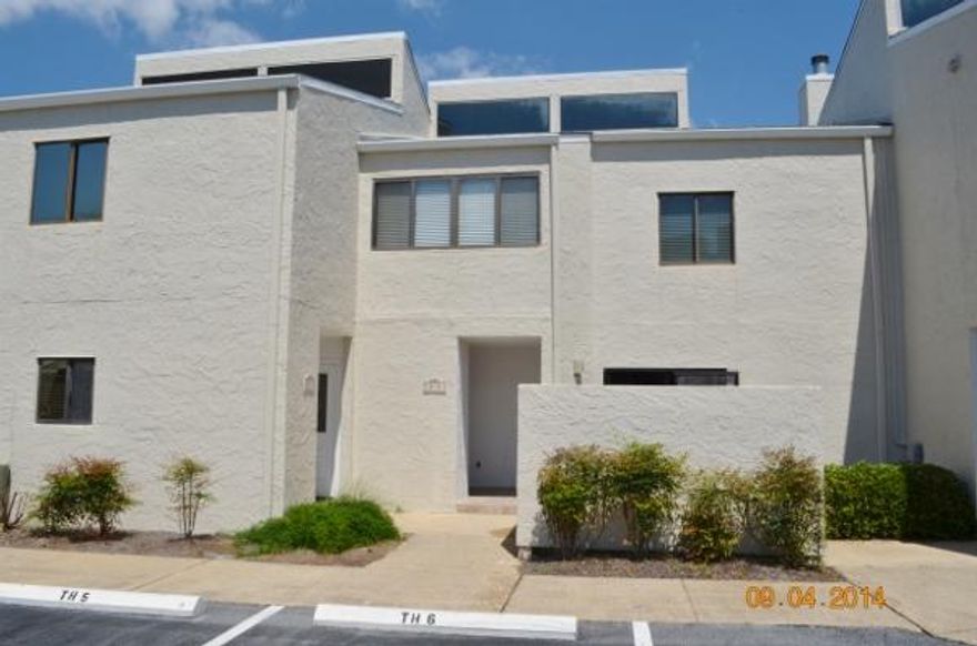 Seller is offering $1,500 towards Condo Cash/HOA dues. (Seller will offer six months HOA association dues not to exceed $1,500) Lakefront Townhome in the heart of Destin. Very nice 2 bedroom 3 bath unit. Very spacious with updated kitchen. Large stone fireplace in living room with sliding glass doors leading to screened porch overlooking the lake. Hardwood floors will lead you up to the bedrooms with their own bathrooms. One bedroom has a balcony overlooking the lake. Shoreline Towers offers many amenities.