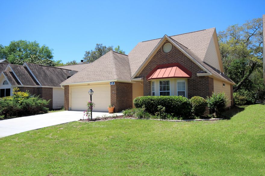 Easy on the pocket book! This contemporary style home offers you the life style you can afford. This home is located in the highly desirable area of Bluewater Bay. This charming, two-street neighborhood is adjacent to the Bluewater Golf Club. You are welcomed by soaring ceiling as you enter the great room that makes this home light and bright. Great room features has wood burning fireplace to enjoy on those cool nights and a mantel waiting for your favorite photos. Great room also features lots of windows which welcomes the natural light. The eat-in kitchen features stove, refrigerator and fairly new dishwasher and plant shelves to display all of your favorite treasures.