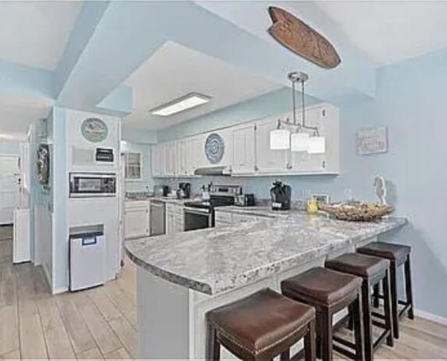 This condo offers an unbeatable location with breathtaking gulf views. Recently remodeled, this unit boasts a third bedroom converted from a bonus room, complete with a full-size bed.

Enjoy a wealth of amenities at your fingertips, including two pools (one heated), a hot tub, tennis courts, pool tables, and 24/7 security. Everything you need for a memorable stay is right here.

Please note that this fully furnished unit is currently booked for the remaining summer season. Be sure to check for showing availability and experience the perfect combination of location, views, and design at Regency Towers!