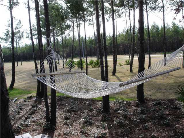 Short sale. Cleared, ready to build! Own your lot and build your future home in one of the Emerald Coast's most exciting premier communities. This lot backs up to environmental preservation areas, so no back yard neighbors. You'll be surrounded by the beauty of nature, with thoughtfully planned walking trails, bike paths, and bayside Clubhouse on the beach. Crammed with amenities, there are also ballparks, tennis courts, fitness center, amphitheater, community park, pool, playground, basketball, meeting facility. You may choose to have your custom home built on this lot by Felix Beukenkamp Builder, or choose from one of his existing plans. Local lender will approve short sale within a few days. CDD pay-off for this lot is $9,512.