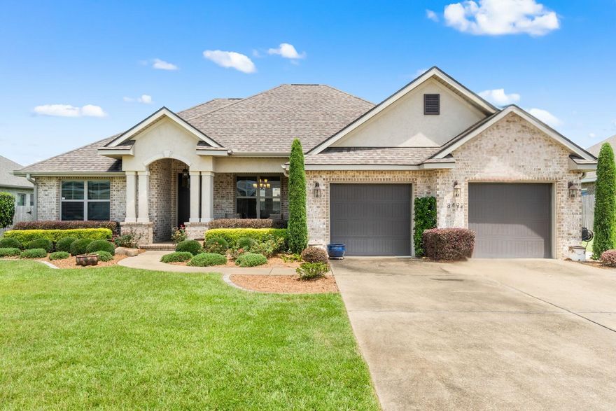Welcome to this meticulously maintained and thoughtfully updated 2017 built home nestled in the Twenty One Oaks subdivision in the Beulah area of Pensacola. This beautiful property offers a split floor plan and features wood-look tile flooring throughout all common and wet areas, as well as an open concept layout that seamlessly connects the dining room, spacious living room, and the kitchen - highlighted by a crown-molding lined tray ceiling in the living room to add a sense of style and elegance. The kitchen offers stainless appliances - including a gas powered stove, granite countertops, a wet island, ample cabinetry, a breakfast nook with a view of the backyard, a separate pantry for storage, and direct access to an interior laundry room for added convenience. Step outside to your very own backyard oasis retreat - complete with a built-in outdoor kitchen grilling area, sparkling pool with sun shelf - perfect for kiddos or catching a tan, fire pit, and a shaded pergola - for the best spot to relax while outdoor entertaining. Back inside, the primary bedroom with spa-like ensuite features a double vanity, soaking tub, separate tiled walk-in shower, water closet, and the most amazing walk-in closet with custom built-in shelves/organization system. Schedule your showing TODAY and check it out for yourself!