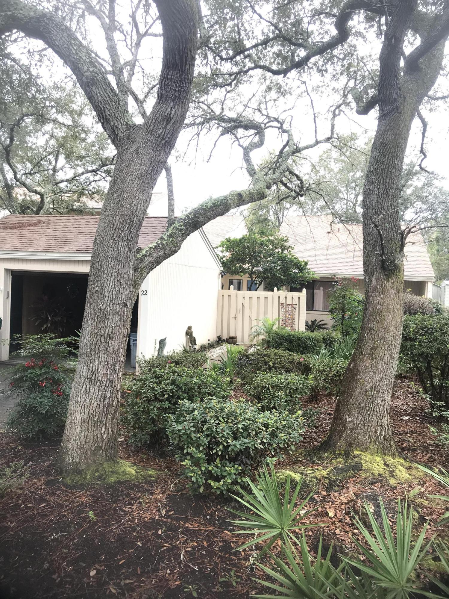 Welcome to Bluewater Bay! Larger floor plan 2 bedroom/2 bath townhome conveniently located in Bluewater Bay. These back end units with the extra outdoor space rarely come available. Great rental history and current renter is aware that things are changing. This unit has washer and dryer, kitchen with dining area with sliding glass doors that overlook the patio area. Large den with Florida room attached. This is back end unit so there is extra outside space. Appliances and HVAC are all new within the last couple of years. New tile floors in Masterbath, guest bedroom, guest bath, and Florida room.Master bedroom has nice master bath and hallway bath is tub/shower combo.Great opportunity for continued rental or make this your permanent home.