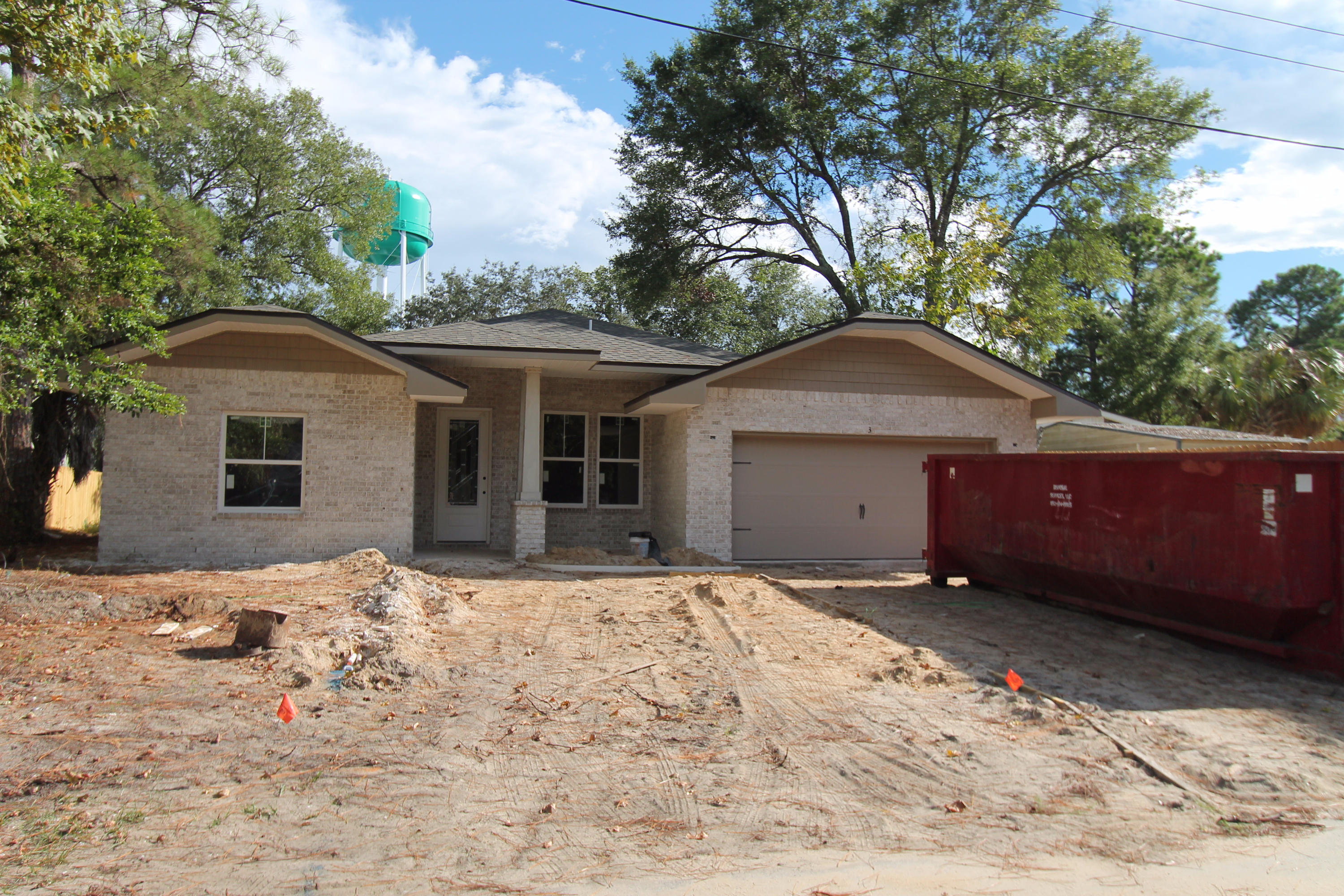Awesome new floor plan by multiple award winning builder!! This 4/3 custom brick home has super curb appeal. There are 10 Ft. Ceilings w/ impressive crown molding, and 5 1/4'' baseboard throughout the main living areas. As you enter the home through the covered front porch, the formal dining room is on your right. As you continue down the hallway, you will then enter the chef's delight kitchen which will boast custom maple cabinetry, granite countertops, 2 large pantry's, and stainless appliances (including an oversized commercial grade frig./freezer). Please view photos for appliance info. The oversized greatroom is in the rear of the home and opens to a covered porch, which is perfect for entertaining. The master suite is oversized, has 2 large walk - in closets, a walk - in shower, a whirlpool garden tub, and a double vanity. The laundry room is at the rear of the kitchen, and has a door which opens to the garage. The yard will be beautifully landscaped and comes complete w/ a well, sprinkler system and timer. Insurance will be very reasonable, as home is built to today's code and plywood window coverings are being provided for storm protection. Home has a Taexx ''in the wall'' pest control system that is serviced from the exterior of the home, for owner's convenience. Completion expected in Dec. 2016. Listing Broker/Salesperson has ownership interest in the property.
