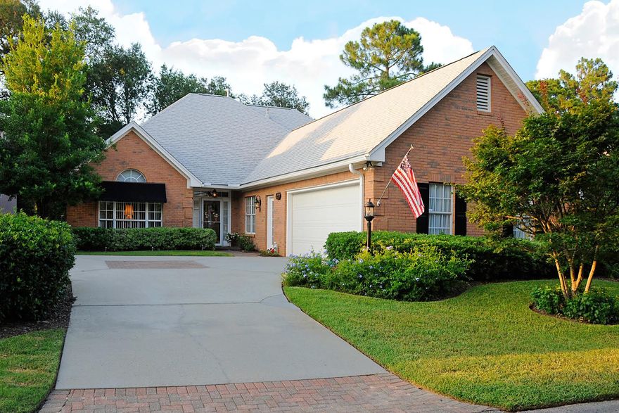 Highly sought after Bluewater Bay golf course front home. This beautiful former model sits on the 6th hole of the Lake Course. Lovely planned community across the bay from world class beaches in Destin. Open floor plan includes vaulted ceiling, recessed lighting, gas fireplace, formal dining area and wonderful eat in kitchen featuring Samsung Staron counter tops along with ample counter space and lush garden and golf course views. Florida room and large patio are perfect for outdoor entertaining. Expansive Master bedroom suite is located on the first floor. Master bathroom features whirlpool tub, stand up shower, double vanity sinks and large walk in closet. Upstairs includes an additional 3 bedrooms, a full bath and a loft area perfect for