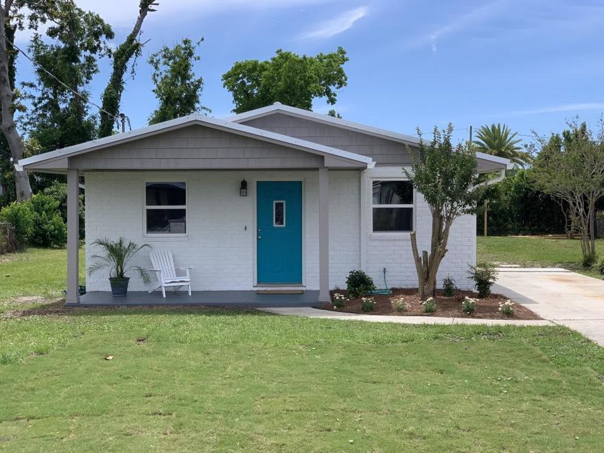 MOTIVATED SELLER! This charming home is nestled in the perfect neighborhood setting of Pretty Bayou. It has been completely remodeled and new features include a metal roof, cabinetry, stainless steel appliances, granite countertops, flooring and windows. Additionally, the electrical was updated and there is all new plumbing, drywall, air ducts and spray foam insulation in both the attic and all exterior walls. This house would be the perfect primary or investment purchase. The central location allows just a quick drive to the beach or into town. Another benefit to this property is a public boat access just minutes away. Don't miss this special opportunity!