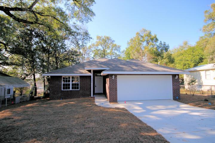 Available 1 May, Located within minutes of Eglin Air Force Base. This 3 bed and 2 baths home features brick and vinyl siding as and a covered back porch perfect for that morning coffee as well as the security and convenience of a large fenced in back yard. Kitchen is highlighted with breakfast bar with granite counter tops, pantry, electric stove, double sink; garbage disposal and overhead shelve. Split bedroom plan. Large Master with double vanity in bathroom. Home is located a very short distance of Turkey Creek Park with a large pavilion and a mile boardwalk. This is the perfect place to enjoy a swim in crisp cool water, kayaks, and tubes. All appliances included Additional Pet fees may apply. Apply at https://forms.gle/xq44AwfwnMGe4nSn6 or Contact Ricardo at 21484298