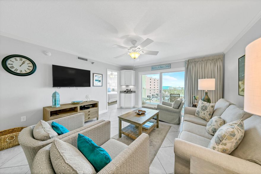 Against a backdrop of gorgeous views from the 5th floor, revel in this spacious 2 bedroom, 2 bath condo located in highly desired Islander. This is the condo you have been waiting for, situated near the best stretch of Destin's white sand beach, this property showcases incredible scenes of the beautiful Lake Christina and the Destin Pass. 513 has all the upgrades you could want including beautiful quartz countertops, sleek white shaker style cabinets, stainless steel appliances, enhanced tray lighting, a walk-in shower in the master bath that features glass doors, and stackable washer/dryer! The Islander has tennis courts, 2 pools, 2 hot tubs, covered BBQ gazebo, exercise room. beautiful lobby, tennis/pickleball courts and landscaping throughout the complex. This is the perfect investment