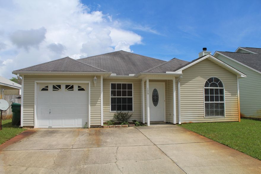 Centrally located! This home is sure to please with it's open floor plan and vaulted ceiling in the living room. Notice How the home fills with natural sunlight giving it a very inviting feeling. The owner has just finished remodeling to include: new paint, new flooring, new light fixtures, and new plumbing fixtures. The kitchen is sure to please with sleek granite and dark stainless steel appliances along with a deep single compartment sink. The master suite is at the rear of the home for added privacy and it also features a walk in closet. This home won't last long so call today for your private tour before it's gone!