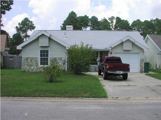 Wonderful family home conveniently located to both bases and Northwest Florida State College/ UWF. Large living room has cathedral ceiling with cozy fireplace. Split floor plan. Large 19X19 covered porch. Rinai water heater. Security system. No smoking. Owner will consider a pet.