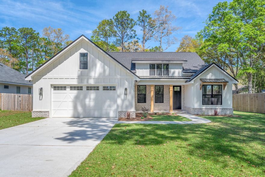 This stunning 3 bedroom, 2 bath custom, modern farmhouse sits on a spacious .5 acre lot ready to accommodate your pool or backyard plans. Custom features include all wood built in shelving in all closets, large tiled master shower with 6' soaker tub, full laundry room cabinets with utility sink, deluxe trim and 8' solid interior doors, 36'' natural gas range, full upgrades Bosch black stainless kitchen appliance package, ventless fireplace and grill connection, solid wood cabinetry with soft close hardware, butlers pantry, wood front porch ceiling, large back porch, tile backsplash, quartz counter tops throughout, Cortec Cario Oak LVP flooring and an irrigation system. That's just to name a few. You will not find another new home of this caliber in our area! Ready to move in!