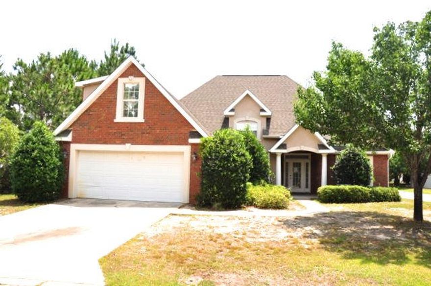 REO. A home you will be proud to show off! Enjoy the view of the pond available to the left side of the home. You can grill and entertain guests on the open patio in the backyard as well. Upon entering the home, you are greeted with a beautiful open and split-bedroom floorplan. The living room features crown molding and a fireplace that beckons you to cozy up next to it on those colder nights. Just off the living room you have an eat-in kitchen that boasts stunning granite countertops, a breakfast bar, and pantry. The master bedroom is conveniently located on the first floor and includes a master bathroom that will fit your every need thanks to its many features: double vanity, large walk-in closet, luxurious garden tub, and a separate shower. Upstairs there is a large fourth bedroom that includes a full bathroom and large walk-in closet. This room could be a great bedroom for guests or could even be used as an office/study! This home also features an incredible location as it is close to Emerald Bay Golf Club, Hwy 98, shopping, and the beautiful beaches of South Walton!