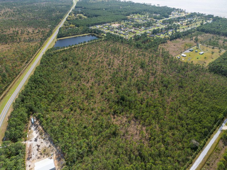 Welcome to 34.14 Acres of natural woodlands  on Avalon Blvd. According to the Santa Rosa County Property Appraiser website, the property is zoned RR1 with 29.14 acres as NON-AG and 5 acres as SFR Rural.   Wetland Delineation Report has been performed and available upon request.   The location is convenient, approx. 5 miles south of I-10,  approx. 7 miles north of Hwy 98 in Gulf Breeze, approx. 2.5 miles to Garcon Point Park (can launch kayaks, boats, jet skis, etc.) and approx.15 miles from Pensacola Beach.    If you are looking for acreage with access to area attractions and conveniences, this is it! Buyer is responsible for verifying all data and information including lot size, as information is deemed to be reliable but not guaranteed