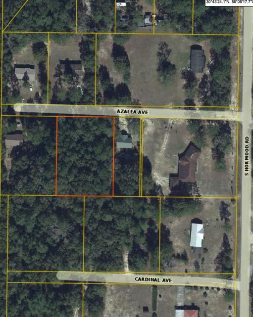 Back on the Market! Don't miss this great opportunity to buy this spacious level lot measuring approximately 150 x 200 on paved road with water and sewer access. Single Family home or mobile home! Possibly annexed into the city of DeFuniak Springs. Beautiful lot for your new home!