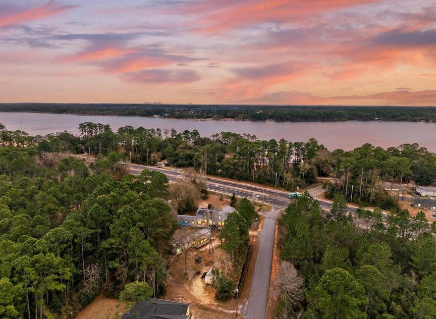 This trailer sits on a double lot. It is zoned for mixed use residential and perfect for a builder or investor. The lot is not currently sub divided. Located just one mile from the Live Oak Street Dock boat ramp, this property offers easy water access while being close to shopping, schools, and Navarre Beach.