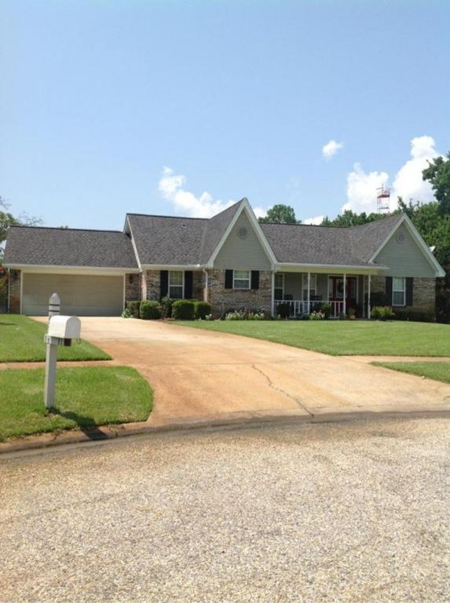 Beautiful three bedroom home with many upgrades! Granite counter tops, hardwood floors, carpet and stainless steel appliances. This home features a spacious living room with wood burning fireplace, wet bar and hardwood floors. Formal dining room with gorgeous chandelier, eat in kitchen area and utility room with washer and dryer included. There is also a bonus room that can be used as a craft room, office or game room. Enjoy entertaining friends and family in the fenced back yard with deck and the covered front porch. This home is a must see! Located in East Navarre with sidewalk community and easy commute to Hurlburt Field AFB, schools, beaches, shopping and more!