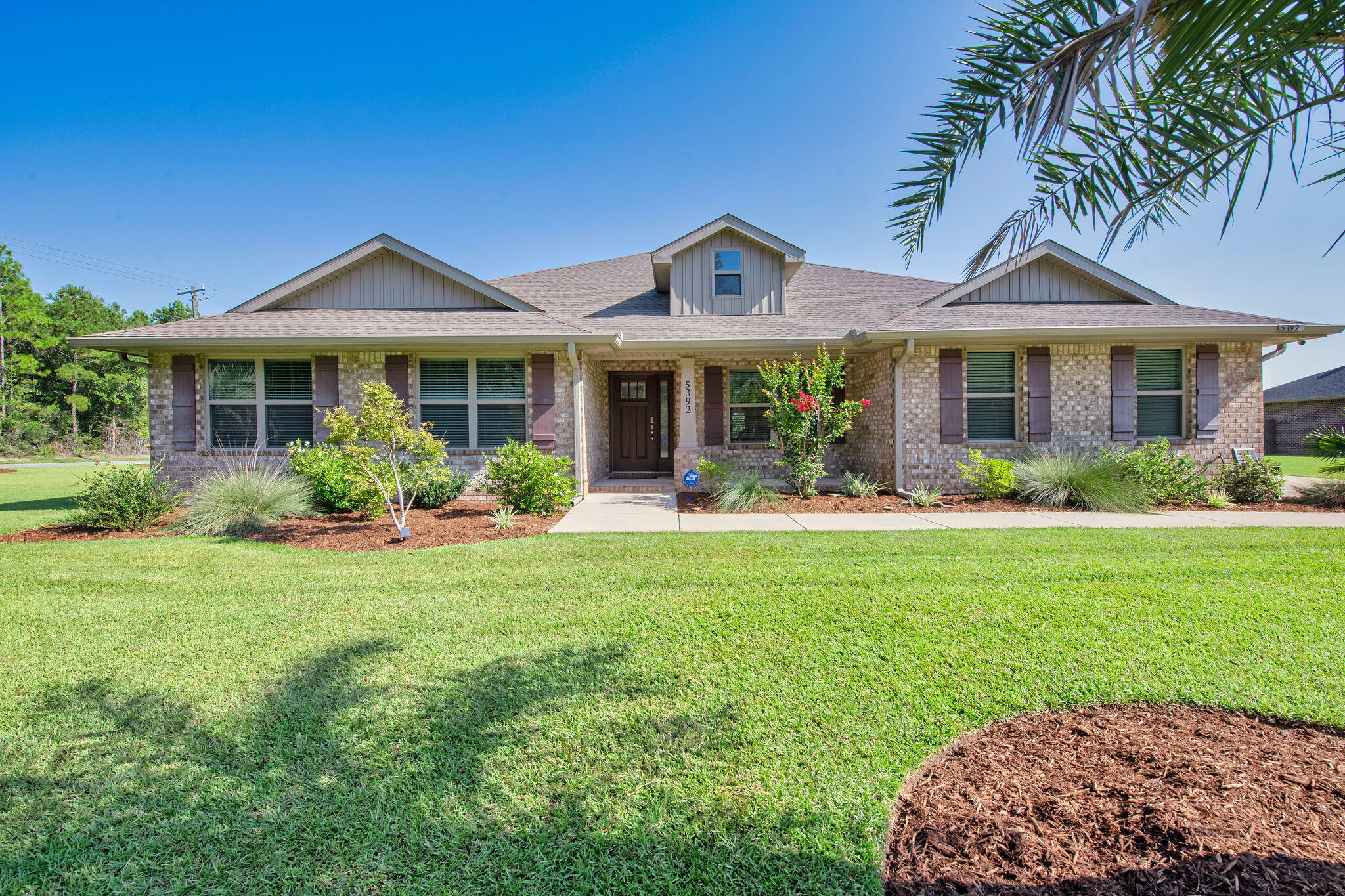 PRICE REDUCED! $20,000 below appraisal.Back on the market, no fault of sellers. Looking for a perfect place that is newly constructed, close to town, NO HOA, room to grow, entertain, relax, and store all your personal property? This is it! This amazing property features a 2,767 sq ft home with 4 spacious bedrooms, 2.5 bathrooms and a side-load 2 car garage with an oversized main driveway. In addition to your main home driveway, the property features another private and separate driveway leading to your Fully Engineered, 30x50' with 16' walls Pole-Barn / Workshop with 100A service and water! The home is situated on a desirable corner homesite of 1.38 acres which has been sodded, professionally landscaped and equipped with an inground sprinkler system.
This property boasts a beautiful open floor plan which has been exceptionally maintained with touches of elegance and comfort. The kitchen is a Chef's delight, showcasing two islands, exquisite granite countertops, antique white shaker cabinets, a large walk-in pantry, and Frigidaire stainless steel appliances. The kitchen seamlessly flows into the expansive family room, adorned with a tall cathedral ceiling, making it an ideal space for gatherings and entertainment. LED fixtures, fans and custom Levolor blinds throughout ensure maximum efficiency and privacy with an optional security system. Luxurious granite finishes in both the kitchen and bathrooms. LVP flooring in the main living areas complements the cozy carpet in the bedrooms.
Sit out back in your oasis-like atmosphere under your covered porch and enjoy a cup of coffee or beverage reading a book or relaxing on the 20x20 concrete patio enjoying serene views of your expansive yard. Don't miss the opportunity to own this beautiful home with exceptional features! Schedule your showing today!"