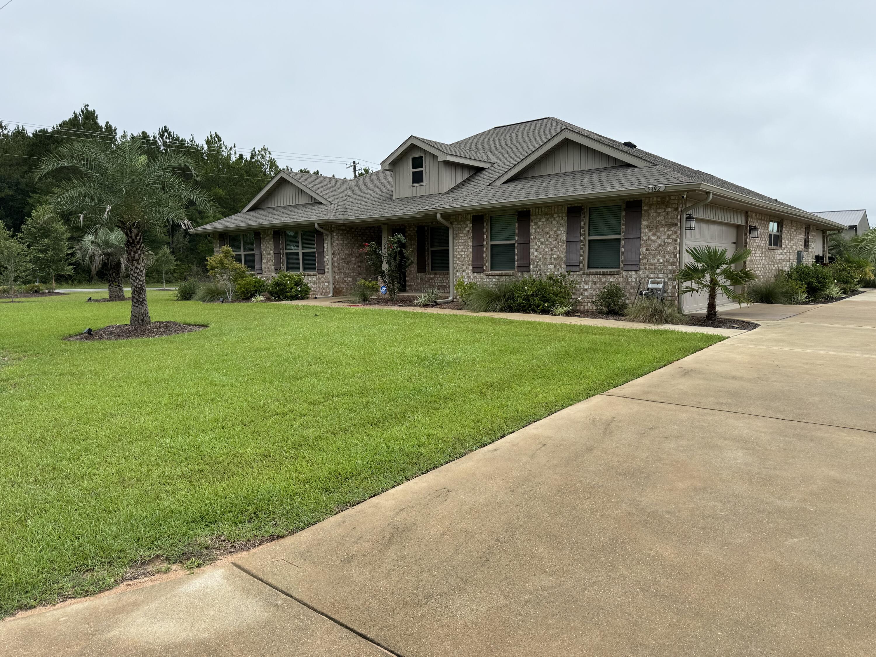 Back on the market, no fault of sellers. Looking for a perfect place that is newly constructed, close to town, NO HOA, room to grow, entertain, relax, and store all your personal property? This is it! Additionally, with a motivated seller willing to assist with closing costs, you had better come and get it while it lasts.This amazing property features a 2,767 sq ft home with 4 spacious bedrooms, 2.5 bathrooms and a side-load 2 car garage with an oversized main driveway. In addition to your main home driveway, the property features another private and separate driveway leading to your Fully Engineered, 1,500 sq ft, 30x50' with 16' walls Pole-Barn / Workshop with 100A service and water! The home is situated on a desirable corner homesite of 1.38 acres which has been sodded, professionally landscaped and equipped with an inground sprinkler system.
This property boasts a beautiful open floor plan which has been exceptionally maintained with touches of elegance and comfort. The kitchen is a Chef's delight, showcasing two islands, exquisite granite countertops, antique white shaker cabinets, a large walk-in pantry, and Frigidaire stainless steel appliances. The kitchen seamlessly flows into the expansive family room, adorned with a tall cathedral ceiling, making it an ideal space for gatherings and entertainment. LED fixtures, fans and custom Levolor blinds throughout ensure maximum efficiency and privacy with an optional security system. Luxurious granite finishes in both the kitchen and bathrooms. LVP flooring in the main living areas complements the cozy carpet in the bedrooms.
Sit out back in your oasis-like atmosphere under your covered porch and enjoy a cup of coffee or beverage reading a book or relaxing on the 20x20 concrete patio enjoying serene views of your expansive yard. Don't miss the opportunity to own this beautiful home with exceptional features! Schedule your showing today!"