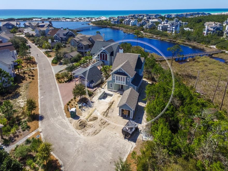 This beautifully designed lakefront home in the community of Watersound Beach is a must see. Finishes include pecky cypress beams, custom cabinetry and millwork, quartz countertops in the kitchen and marble countertops in the bathrooms, an elevator and Wolf and Subzero appliances. There is a master suite on both the second and third floors and two guest bedrooms plus bunkroom on the first floor. A spacious outdoor space includes a salt chlorinated pool and deck with plenty of room to relax. From the porches enjoy the views of Camp Creek Lake and extended views of the Gulf of Mexico. This residence radiates the peacefulness of its surroundings which is truly one of a kind. Come view this rare opportunity today!