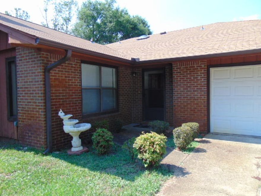 QUIET END UNIT AT THE END OF STREET. VAULTED LIVING ROOM HAS A FIREPLACE. SKYLIGHT IN DINING AREA LETS IN NATURAL LIGHT INTO THE LARGE KITCHEN WITH PANTRY. ALL NEWER TILE IN THE KITCHEN AND DINING AREA, AS WELL AS THE ENTRANCE! MASTER HAS PRIVATE BATH ROOM WITH WALK IN SHOWER. 2ND BED ROOM HAS SLIDING GLASS DOOR TO BACK PATIO WITH WOODEN PERGOLA. HOME IS EQUIPPED WITH ALL ELECTRIC APPLIANCES, REFRIGERATOR, DISHWASHER, WASHER AND DRYER. STORAGE SHELVES AND UTILITY SINK IN OVER SIZED GARAGE. A/C WAS REPLACED 10/2014. LAWN PUMP WAS REPLACED AND NEW AUTO GARAGE DOOR OPENER INSTALLED 10/2015.