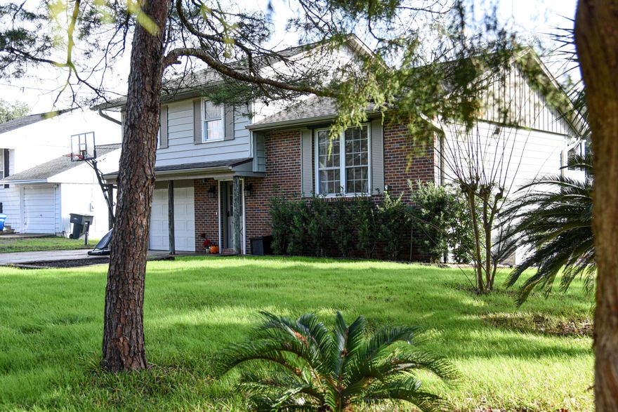 Home is move-in-READY with many improvements in the 3 years of ownership.They have added pine wood flooring in the Living Room, Dining Area and Bedrooms. The interior air conditioner has been replaced and the exterior has a new fan motor. Exterior decking has been refurbished and a storage shed built.The home is equipped with a generator with hard wire connect for safety, a water softener, insulated garage walls, hurricane shutters, a screened in porch and 2 city water lines (one for the home, one for the sprinkler system in the yard).The finished basement is a large family room area that opens to the screened in porch while the upper level has a new door to take you out to the deck.This home is centrally located, moderately priced and ready for YOU!