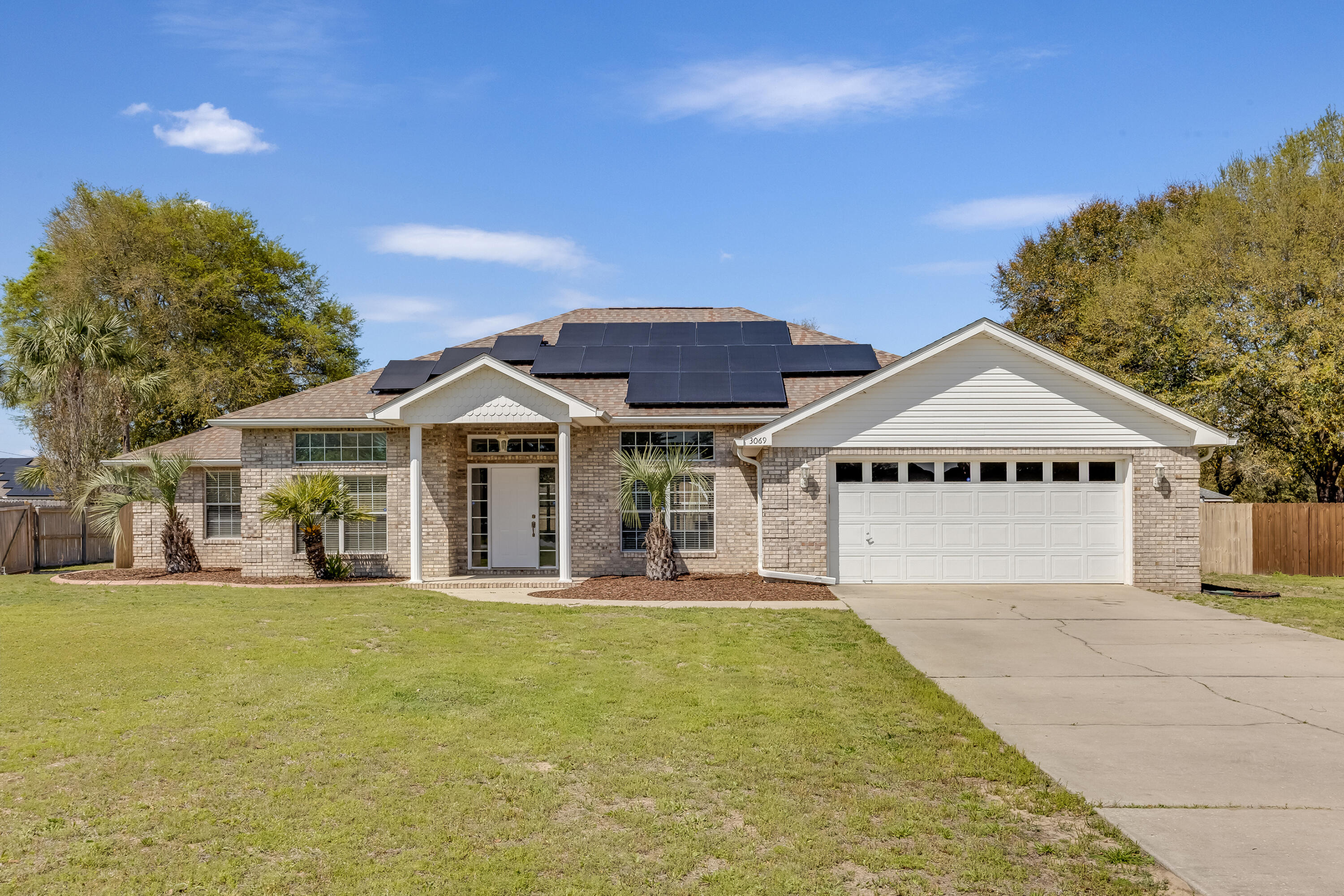 SOLAR PANELS WILL BE PAID OFF AT CLOSING SAVING THE BUYER ROUGHLY $40,000. ENJOYING THE BENEFITS OF SAVING ON ELECTRICITY. Welcome to this beautifully updated 4-bedroom, 2-bathroom home, built in 2003, offering 2,332 sq. ft. of comfortable living space on a spacious 0.37-acre lot. With numerous upgrades and a fantastic backyard, this home is move-in ready!Key Features:-New Interior Paint - Freshly updated for a modern, clean look.-New Rain Gutters - Recently installed for improved drainage.-Solar Panels - Energy-efficient living-New Wood Floors - Stylish and durable flooring throughout the home.-In-Ground Pool & Hot Tub-Well for Sprinklers - Keep your lawn lush without the added water bill.-New Septic Tank Lines - Recently updated-Smart Thermostat - Energy savings -Updated HVAC Unit - The outdoor A/C unit is less than 2 years old.
-Covered Patio with Updated Flooring - Ideal for outdoor enjoyment.
-Central Vacuum System - Enjoy easy and efficient cleaning throughout the home.
This home offers modern comforts, a spacious layout, and a fantastic backyard retreat. Don't miss your chance to own this stunning
property schedule a showing today!