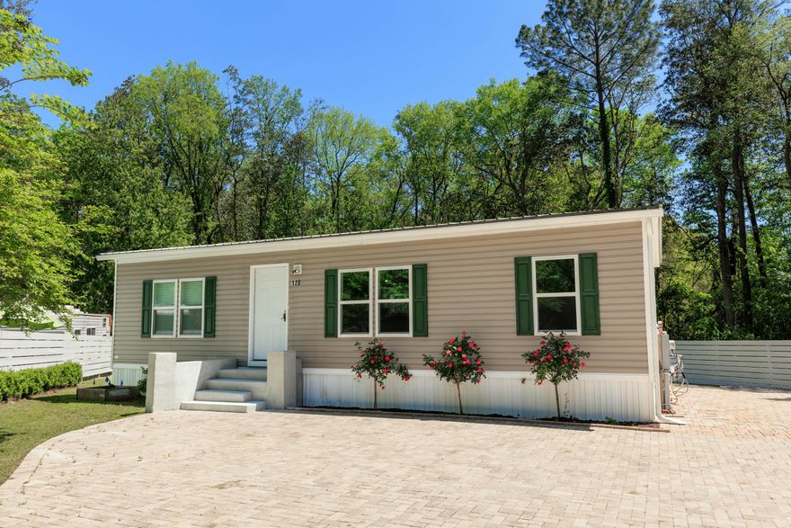 $25,000 PRICE DROP! Renovated 3BR/2BA Home.Welcome to your beautifully renovated coastal retreat! This charming 3-bedroom, 2-bathroom mobile home offers 1,080 square feet of stylish living space on a spacious 0.056-acre lot, perfect for entertaining and enjoying the Florida lifestyle. The home has been fully renovated with modern finishes. Luxury Vinyl Plank (LVP) flooring throughout,sleek granite countertops in the kitchen featuring a  breakfast bar. Freshly painted. Durable metal roof and alarge lot ideal for outdoor gatherings. RV Connections in place.This home is conveniently located just minutes from Grady Brown Park by the bay and to the beautifull white sand beaches of the Emerald Coast.Enjoy peaceful coastal living while staying close to shops, schools, and restaurants Whether you're looking for a full-time residence, a vacation getaway, or an investment opportunity, this home has it all. Move-in ready and packed with charm - come see it before it's gone!