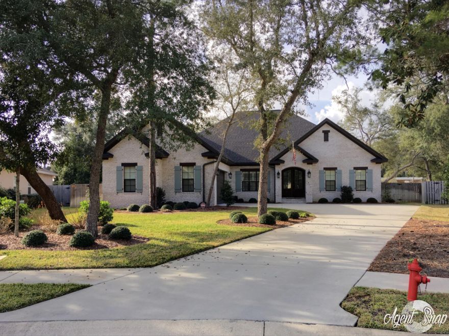 Absolutely stunning, custom home by Randy Wise in highly sought after Swift Creek. Only two years old so looks brand new! Sellers have meticulously maintained this 4 bedroom, 3 1/2 bath home and have recently added a $40,000 patio (also built by Wise). Enter the home and immediately notice the gorgeous wood flooring, crown molding and upgraded lighting. The large living area flows easily into the gourmet kitchen and dining area. You'll love the kitchen with its abundance of cabinets, granite countertops, walk-in pantry, stainless steel appliances, breakfast bar and more. Just off the living room is a beautiful study with sliding ''barn-door'' closure and a brick wall accenting this cozy space. Use it as a den, study, office, bar area....The master bedroom tucked privately on its own si