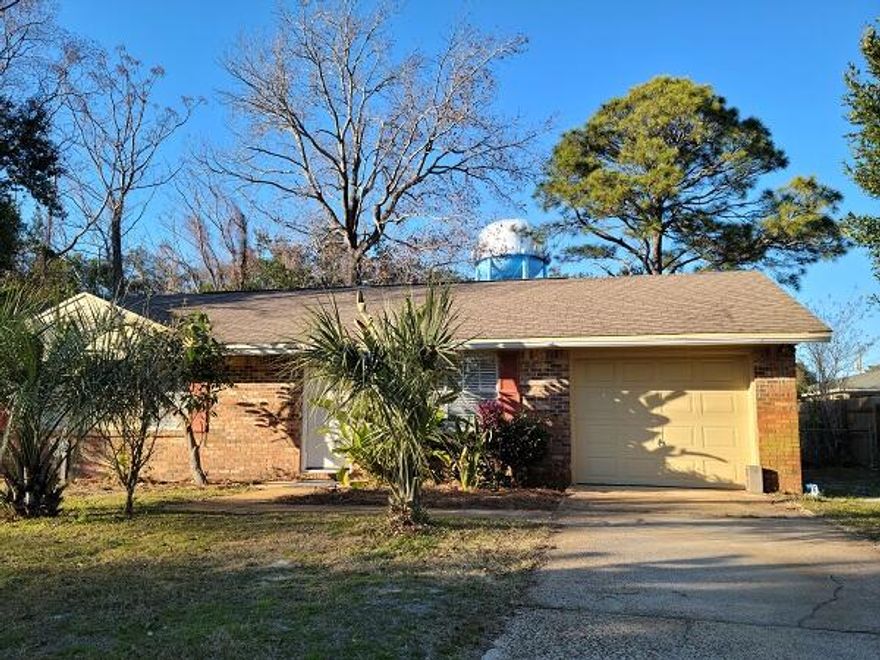NEWLY RENOVATED UNFURNISHED HOME IN THE HEART OF DESTIN. OPEN LIVING ROOM LEADS TO EAT IN KITCHEN. KITCHEN HAS SLIDNG GLASS DOOR THAT LEADS TO OPEN PATIO WITH A LARGE BACKYARD. HOME HAS BEEN PAINTED WITH NEW NEW LAMINATE FLOORING. LIVING, KITCHEN AND BATHS HAVE TILE. SINGLE CAR GARAGE WITH ROOM FOR WORK AREA & STORAGE. WASHER DRYER CONNECTIONS IN GARAGE. NEW AC, PETS NEGOTIABLE WITH OWNER APPROVAL AND DEPOSIT/FEE