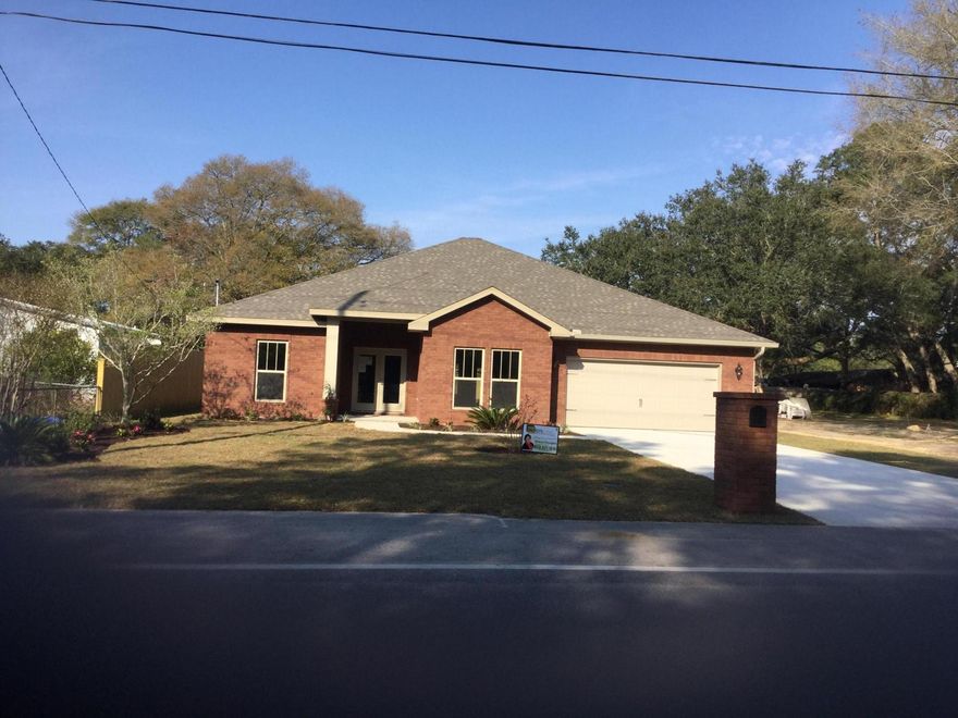 Brand New All brick custom home under construction centrally located in Fort Walton Beach.
Minutes away from military bases and beaches. Features include double glass French entry door, covered porches, open kitchen with custom cabinetry, granite countertops, 9' and 10' ceilings,187ft deep large lot with sprinkler system and two car garage. This home has large bedrooms, separate dining room, w/p tub and separate shower in master bath. Custom trim package with 8 inch baseboards and crown molding and a fully landscaped yard. Kitchen includes Kenmore stainless appliances. Call now and choose your colors for interior finishes. You won't be disappointed with this new custom home.
