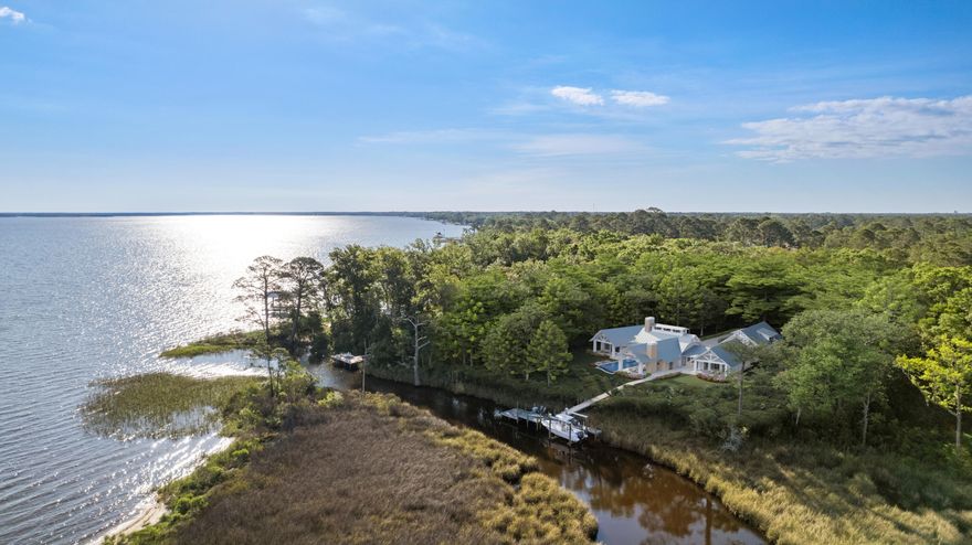 Welcome to the Estuary, one of the most exclusive gated communities in Santa Rosa Beach. Boasting 122 feet of deep water frontage on the bayou, this homesite is a boaters dream. The Architectural plans designed by Chris Stoyles with Archiscapes have been completed and approved by the ARB and convey with the sale. This lot features a newly built private dock and boat lift. The Estuary is a serene gated community offering beautiful views and is only a few minutes from 30A and the beautiful beaches of the Emerald Coast. This lot is ready to be built on and accommodate your waterfront lifestyle.