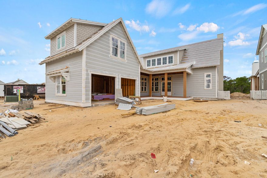 Blending timeless design with modern livability, the Weatherly, by Romair Homes, offers a spacious and thoughtfully crafted layout within the Powell Landing East neighborhood of Watersound Origins. Totaling 5 bedrooms and 5.5 bathrooms, this home design features 3,459 square feet of conditioned living space in the main residence, with a 576-square-foot carriage house, a two-car garage, and just over 1,200 square feet of porches and decks, creating an ideal balance between indoor comfort and outdoor connection.The main level opens into a bright, open-concept floor plan that flows seamlessly from the kitchen and dining area to the expansive living room. Generous windows and soaring 12-foot ceilings enhance the natural light throughout, while the home's architectural details and clean lines reflect Romair Homes' signature craftsmanship. The primary suite is located on the first floor for convenience and privacy, complemented by well-appointed guest rooms and inviting common spaces throughout. The carriage house, thoughtfully designed to mirror the style and integrity of the main home, adds approximately 576 square feet, the perfect retreat for guests, a private studio, or additional living space.

With careful attention to detail, this tailored home includes a curated selection of upgrades with 16-foot slider doors in the living room, a 42" stucco-clad linear fireplace, stained white oak cabinetry, and champagne bronze plumbing fixtures and cabinet hardware, and an outdoor oasis package including a 14' x 22' pool, accompanied by a spa, baja deck outdoor summer kitchen and a cabana with fireplace, designed to enhance both the functionality and aesthetic of the home. Standard features include Wolf and Sub-Zero appliances, Silestone quartz countertops throughout, 6" engineered white oak flooring (except full baths), custom cabinetry with soft-close drawers and doors, impact-resistant PGT windows and Neuma multi-point locking doors, solid-core Shaker interior doors, and designer lighting selections.

Situated within the scenic Watersound Origins community, the Weatherly plan embodies a sense of ease, craftsmanship, and connection, perfectly designed for those who value thoughtful design and the relaxed rhythm of life along the coast.

Estimated completion: mid-March 2026

The Watersound Origins community is one of South Walton's most coveted neighborhoods for its exceptional amenities, beautiful new homes, and prime location. Amenities include the Village Commons pool & fitness center, sports courts including tennis and pickle ball, miles of nature trails, dock access to Lake Powell, unlimited golf, and lots of green space for outdoor play. The all new Watersound Town Center brings a new level of excitement and convenience to the community with a Publix Super Market, delicious restaurants, healthcare facilities, and more right at the entrance to the neighborhood!

*Pricing for inventory homes include lot premiums and may include optional upgrades. Added options/upgrades and pricing are subject to change.