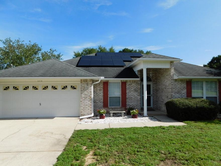 Wonderful ranch style home with a split bedroom floor plan. Bedrooms 2&3 share a ''Jack and Jill'' bathroom. There is a formal dining room as well as an office/media room. The great room and master bedroom have sliding doors glass doors to the screened porch and overlooking the spacious deck and back yard. The large deck is great for entertaining with large shade trees and good privacy with the wood fencing as well. There is a high quality solar system recently installed ($35,000 costs)  that completely has been eliminating electric bills. There is a newer tank less water, a new high end Samsung gas range and a high efficiency Amana HVAC system installed in 2019!  This split bedroom floor plan also offers a formal dining room and an office/media room at the foyer area. Many upgrades !!