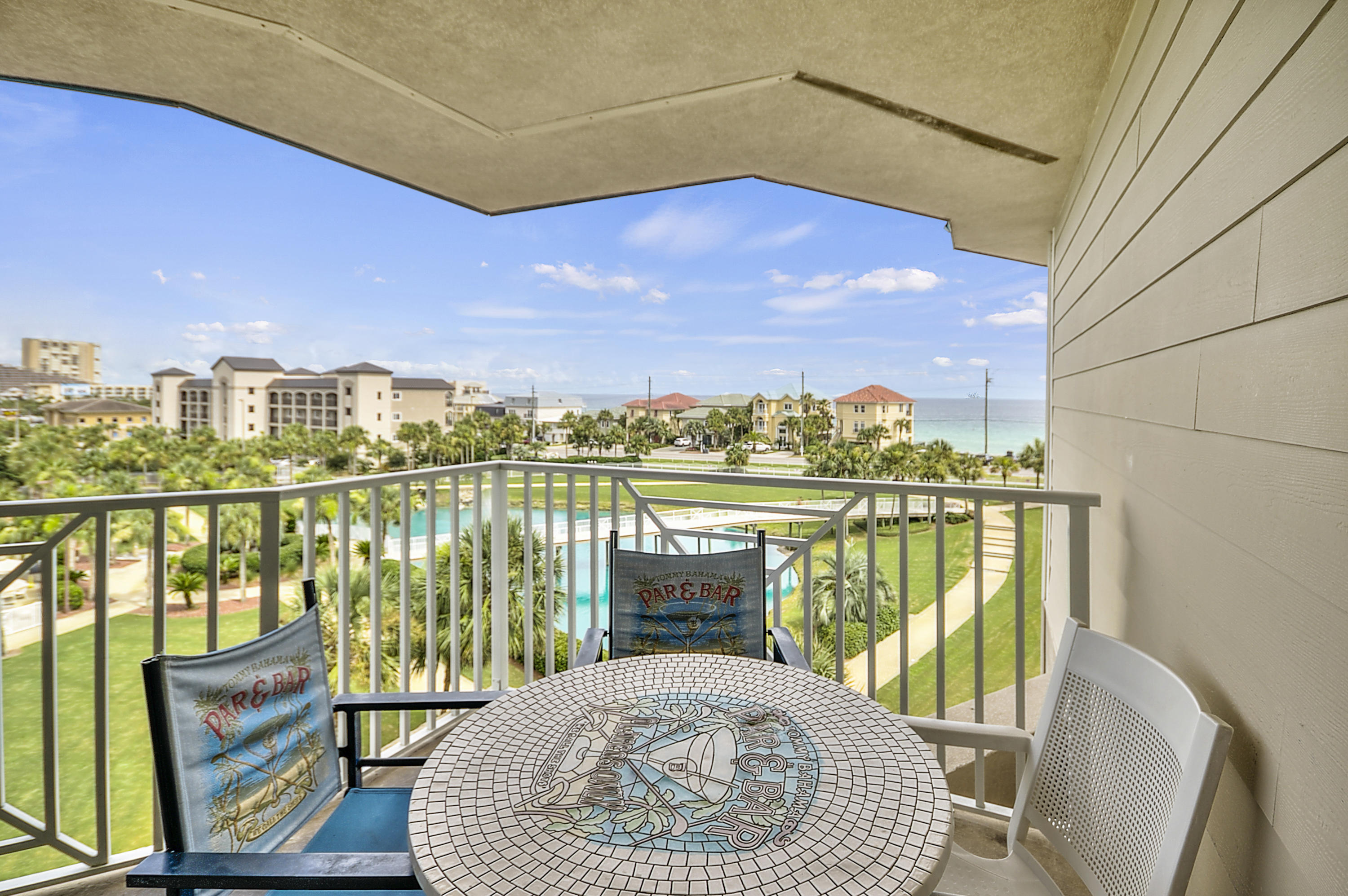 4-12-19: REDUCED AGAIN!! ANOTHER $10K! SELLER WANTS OFFER!!! Penthouse level 4th floor, 2 bedroom/2 bath condo WITH an assigned parking space AND assigned storage locker in the garage, in the Southernmost building at Amalfi Coast Resort with fabulous unobstructed views of the pristine Gulf of Mexico. Amalfi Coast Resort is gated and fenced and encompasses 8.6 acres lush with tropical plantings and trees, two huge pools surrounded with cabanas, walking trail around the lake featuring a fountain with night lighting which illuminates the grounds providing a festive scene, 362' of BEACH ACCESS which has a gazebo AND don't forget the two lighted tennis courts, BBQ/picnic areas, and dog walk. Here's what's been updated: New Furnishings in Living Room & Dining Room,
