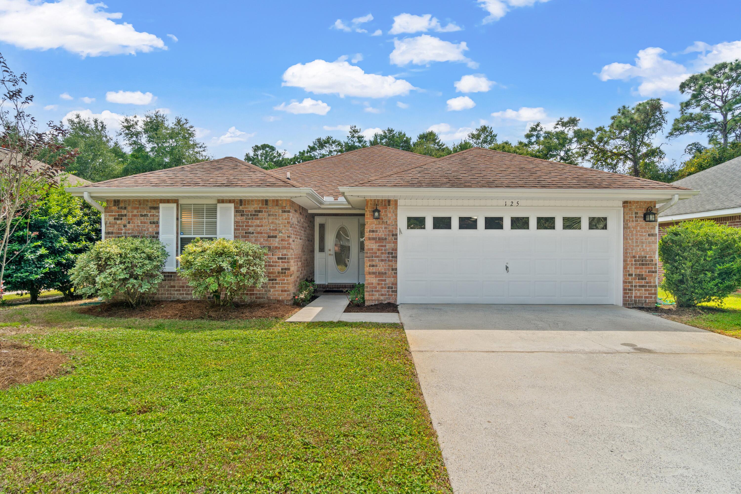 Welcome to 125 Bayou Landing, nestled perfectly in between Scenic Highway 30A and the spectacular sugar white sand beaches of the Emerald Coast. Upon entering this spacious 3 bedroom, 2 bathroom brick home, you will notice the expansive open floor plan with vaulted ceilings and an abundance of living space. Featuring wood floors in the living room, stainless steel appliances, and updated hardware throughout to give this home a sleek finish. Do you love patio life? Well wait until you see the serene backyard oasis, with a private pool that will be the ultimate focal point of your outdoor living and entertainment! Superbly maintained, this brick home is located within close proximity to all major entertainment, dining, and shopping amenities this region has to offer.