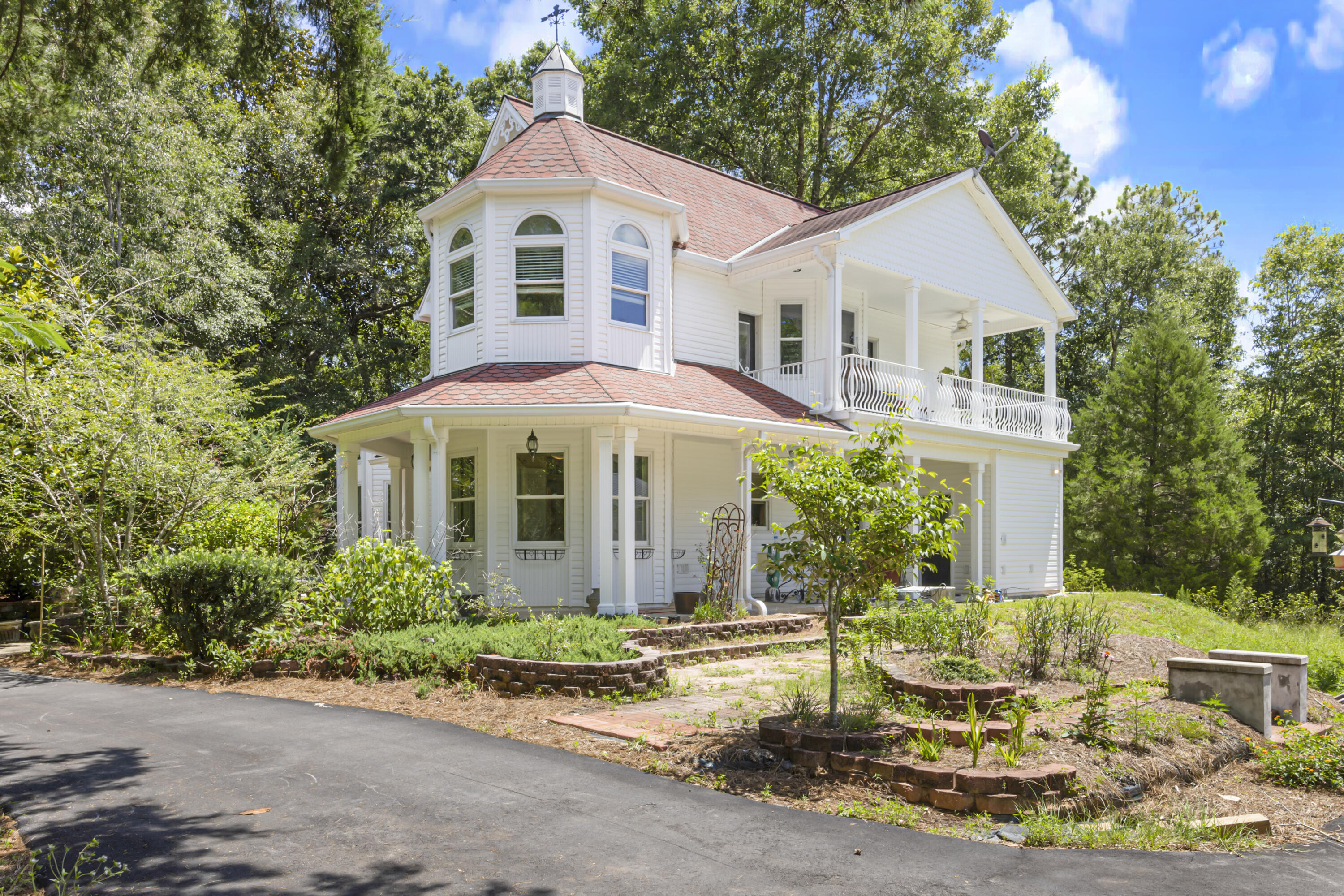 Beautiful custom built home in the country sitting on 5 acres !!! On the first floor you'll find the beautiful family room with a fireplace, high ceilings, the beautiful eat in kitchen, a nice size bedroom or office, a full bathroom, the laundry room, the dining room and the utility room. Upstairs you have the master suite with attached master bath and owners closet, a third bedroom with adjoining bath, and a spacious flex room that could easily be converted to a fourth bedroom. Both bedrooms upstairs have access to a beautiful balcony overlooking the estate. Outdoors you can walk on your property and enjoy the natural scenery and the wildlife. The home has a recently built detached 30'x 24' building that would make a perfect workshop for the handyman, or convert it to a detached garage.