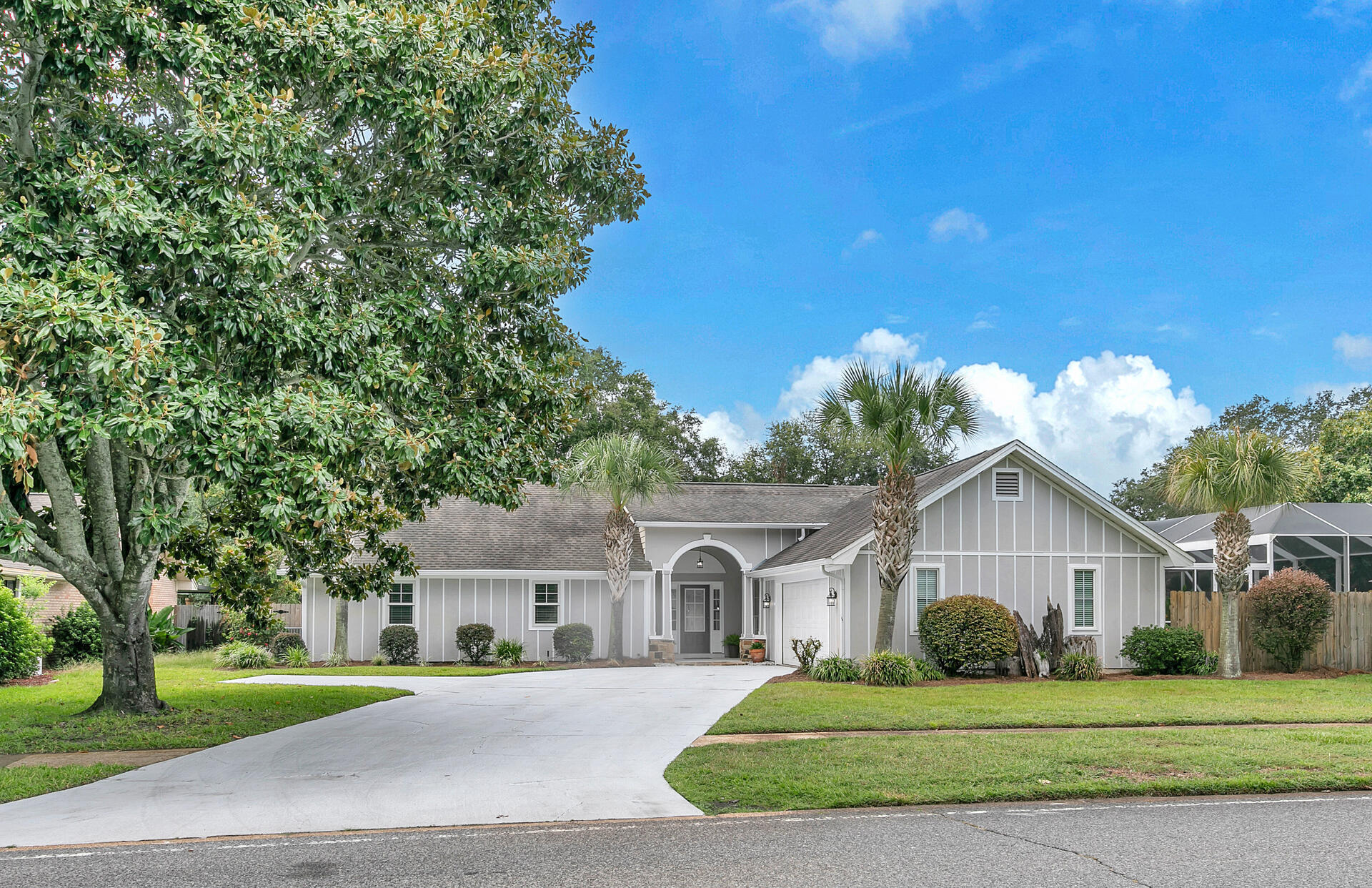 NEW PRICE!! Welcome to Indian Bayou, one of Destin's most prestigious communities, where comfort, space, and charm come together in this 4-bedroom, 2,646 SF home. Situated on a 0.4+/- acre lot, this inviting residence offers a beautiful backyard retreat, spacious living areas, and a thoughtfully designed floor plan perfect for larger families or those who love to entertain.The expansive master suite features vaulted ceilings with exposed beams, creating an inviting and airy atmosphere. French doors provide direct access to the patio, allowing for seamless indoor-outdoor living. The master bedroom offers plenty of space for a cozy sitting area or private retreat.Outdoor living is a highlight of this home, with a screened-in pool featuring a brand-new liner (2024), providing the perfect spot for year-round relaxation. The large backyard offers ample space for entertaining, gardening, or outdoor activities in a peaceful golf course community setting.
Inside, the spacious living room includes a wood-burning fireplace, creating a warm and welcoming ambiance. A separate bonus room is ideal for a home office, media room, or gaming space, providing flexibility to fit your needs.
The well-appointed kitchen is designed for functionality and style, featuring a gas range, double ovens, granite countertops, and custom cabinetry. With plenty of counter and storage space, meal preparation is both easy and enjoyable.
This home is built for comfort and peace of mind, with a whole-house generator for uninterrupted power, hurricane panels for added protection, and durable Hardiboard siding for low-maintenance living. A tankless water heater ensures efficient and continuous hot water.
Located in the highly sought-after Indian Bayou community, this home is just steps from the public golf course. The neighborhood offers low HOA fees, sidewalk-lined streets, and a welcoming atmosphere. It is also conveniently located just minutes from world-class shopping, dining, and Destin's renowned sugar-white beaches.
This is a rare opportunity to own a home that offers the perfect blend of space, comfort, and coastal living. Schedule your private tour today to experience all that this exceptional property has to offer. Call today for a tour!