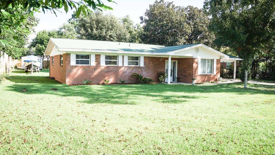 NEAR EGLIN AFB in desirable Poquito Bayou. Newly updated 3-bedroom 2-bath classic brick home lives larger than its square footage, feels fresh and is move in ready. The large kitchen features a cook's island and breakfast bar. The table space overlooks the great room with a pretty iron railing. Step down into the great room with its unique inset ceiling. There is a separate formal dining area. The three large bedrooms each have new carpet. Off the great room is a huge screened porch. The in-ground pool has a new wood deck for lounging, and there is a brick pool house that can be used as your workshop. The large carport and laundry/utility room provide extra storage. Note: metal shed does not convey. This neighborhood features a public boat ramp and playground.