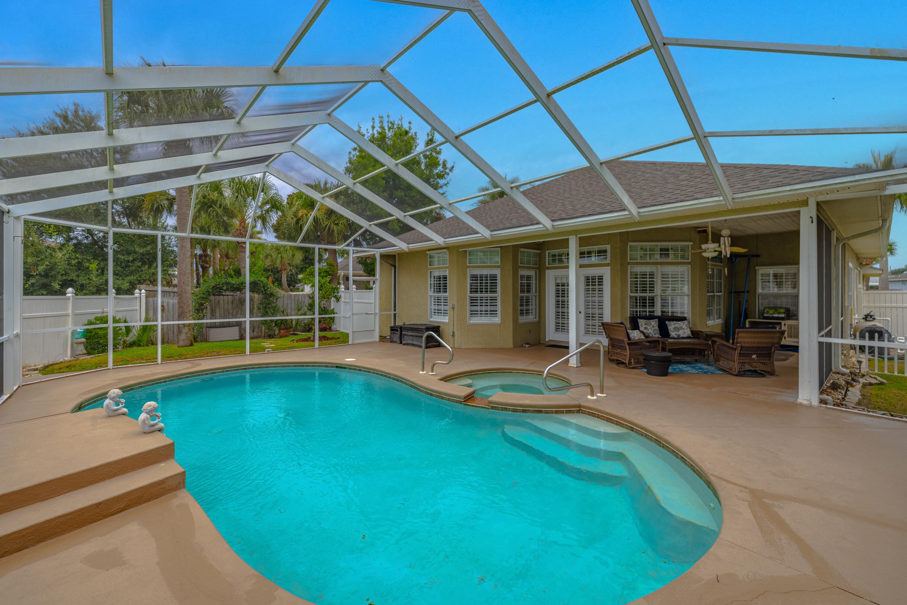 Welcome to 106 Bimini Court, a beautifully maintained home tucked away on a premium lot in the desirable Summer Breeze neighborhood in Panama City Beach! This fully furnished residence offers the perfect mix of comfort and convenience, with a low HOA of just $300/year. Inside you will find high ceilings, a cozy fireplace, and a split-bedroom floor plan that ensures privacy for family and guests. The kitchen and living spaces flow seamlessly, making entertaining a breeze! Outside, you'll love the screened-in pool and hot tub, providing you with your own private oasis for relaxing year-round. This home is perfect for hosting & entertaining! The home is beautifully landscaped and move-in ready, so you can start enjoying beach living right away.(CONT IN ADD. REMARKS) Located just minutes from Pier Park, TopGolf, Dolly Parton's Pirates Voyage, and the 30A corridor, this property places you close to all the shopping, dining, and entertainment the area has to offer. Truly a wonderful location!! Whether you're looking for a permanent residence, vacation home, or investment property, 106 Bimini Court is sure to check all the boxes! Come see it today!