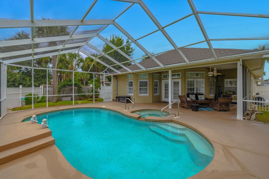 Welcome to 106 Bimini Court, a beautifully maintained home tucked away on a premium lot in the desirable Summer Breeze neighborhood in Panama City Beach! This fully furnished residence offers the perfect mix of comfort and convenience, with a low HOA of just $300/year. Inside you will find high ceilings, a cozy fireplace, and a split-bedroom floor plan that ensures privacy for family and guests. The kitchen and living spaces flow seamlessly, making entertaining a breeze! Outside, you'll love the screened-in pool and hot tub, providing you with your own private oasis for relaxing year-round. This home is perfect for hosting & entertaining! The home is beautifully landscaped and move-in ready, so you can start enjoying beach living right away.(CONT IN ADD. REMARKS) Located just minutes from Pier Park, TopGolf, Dolly Parton's Pirates Voyage, and the 30A corridor, this property places you just minutes to all the shopping, dining, and entertainment the area has to offer. Truly a wonderful location!! Whether you're looking for a permanent residence, vacation home, or investment property, 106 Bimini Court is sure to check all the boxes! Come see it today!