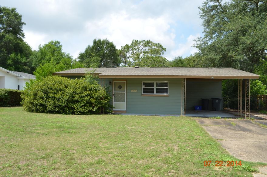 Located in the heart of Valp this property is cute as a button and priced to sell! All brick/block exterior, with laminate floors in kitchen, 3 bedrooms and 2 full baths. The property has a covered carport with entry into the home from the carport and a workshop in the back yard. Back yard is fenced with chainlink fencing as well. A great place to call home and priced according to condition. Don't let this one slip on by, call today for your showing!
