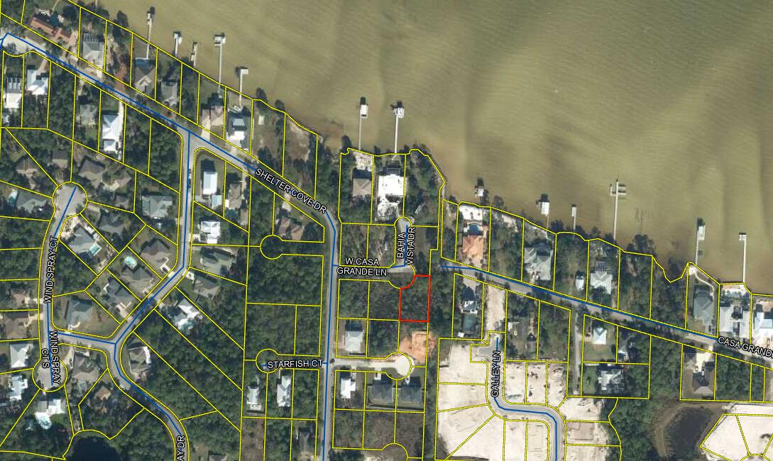 Discover your dream lot! This prime location, just steps from Choctawhatchee Bay, offers the potential for captivating bay views. Minutes from Grand Boulevard shopping and the pristine white sands of 30A, this lot is your gateway to coastal paradise. Don't miss this rare opportunity!'