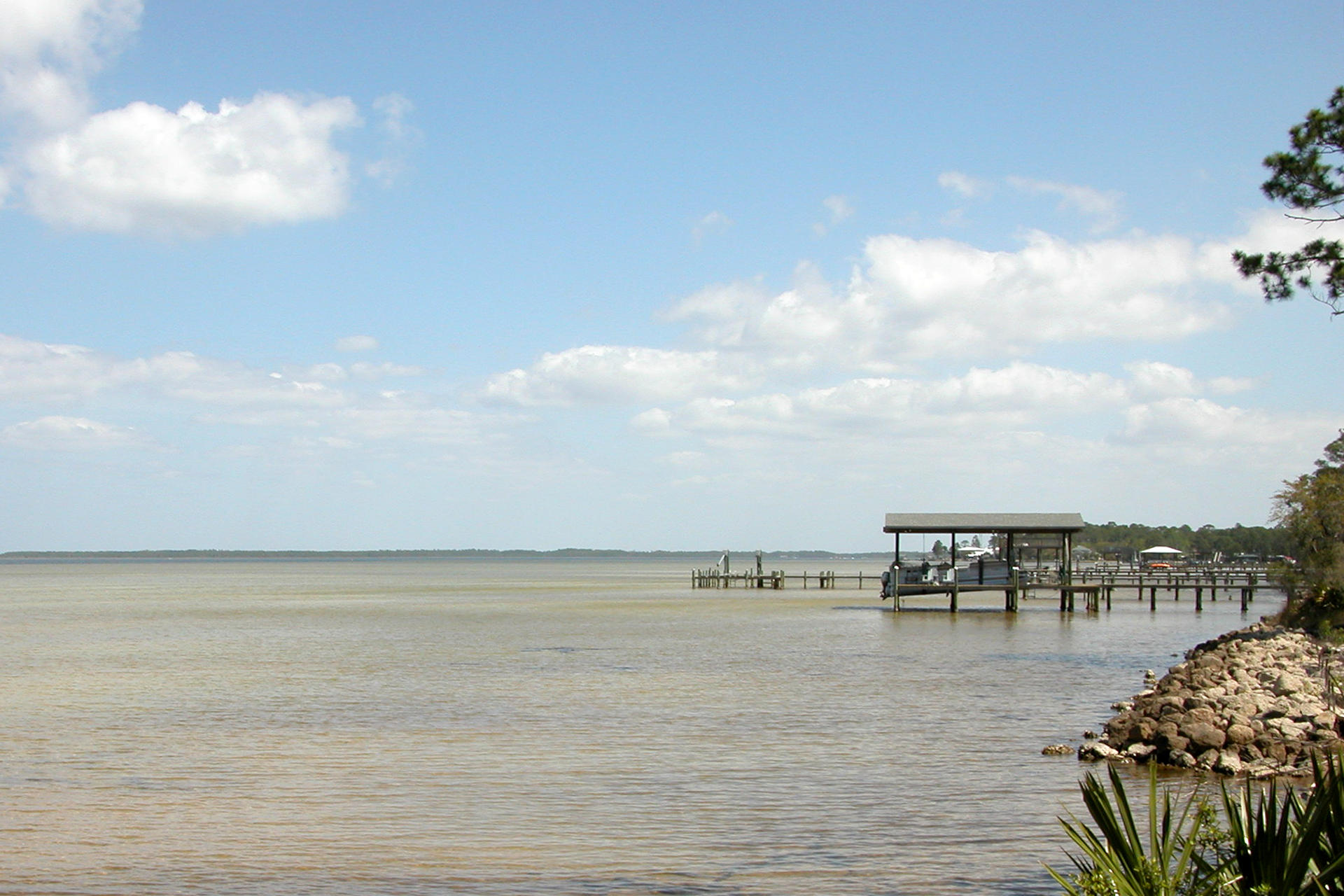 Gorgeous 0.46 of an acre lot with 99 feet of bay front. This lot is the perfect place to build your Bayfront home. Lot has rip-rap and there are utilities in the community. This is a great opportunity for a buyer that wants panoramic bay views in a private setting. Buyer to verify all information.