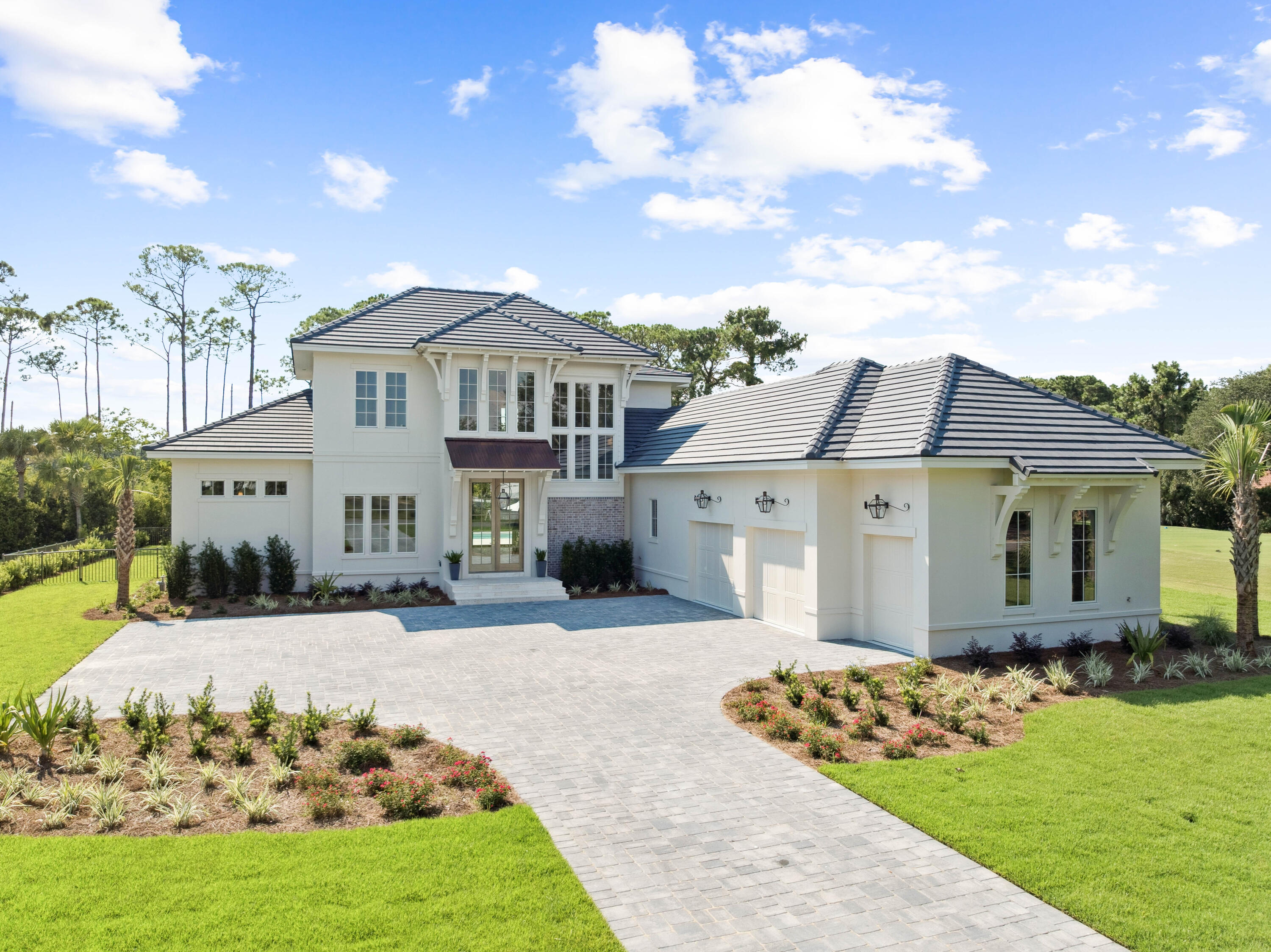 Welcome to the epitome of luxury living with this stunning new construction home, meticulously crafted by Vlahos,DeBogory and Tuck Construction. Blending modern elegance with thoughtful design, this is your private oasis nestled in RegattaBay, one of the most sought-after communities in Destin. As you step inside through the custom Mahogany doors you'll be greeted by an expansive open floor plan, 12 foot ceilingsand oversized sliding doors and windows which allow natural light to fill the space. The gourmet kitchen is a chef's dream equipped with Wolf/Sub-Zero appliances, 2 islands, and custom cabinetry. The master wing of the home provides a lavish space to unwind with a spa-like bathroom and spacious walk-in closet. Enjoy seamless indoor-outdoor living through the 16 foot sliding
glass door showcasing the resort style back yard perfect for entertaining, or relaxing in peace.
The second level offers 3 bedrooms, 2 bathrooms and an additional family room equipped with its own kitchenette making
this the perfect spot for games and movie nights.