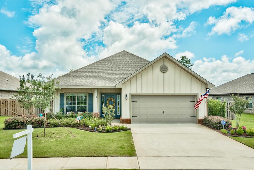 UPGRADES GALORE in this immaculate, 3 bedroom, 2 bath home situated on a community LAKE in the Passages neighborhood of Hammock Bay. Beautiful TILE and HARDWOOD flooring throughout! The large EAT IN KITCHEN has SLAB GRANITE counters, CUSTOM BACK SPLASH, tons of cabinet and counter space, including KITCHEN ISLAND. A Flex space, currently used as a HOME OFFICE, can easily convert to a FORMAL DINING ROOM. Screened in patio off of the Great Room - perfect for morning coffee or al fresco meals. A split bedroom floor plan, the Master Bedroom has an EN SUITE BATH, with DOUBLE SINK VANITY, SEPARATE SHOWER and GARDEN TUB with upgraded GLASS TILE surround. Plenty of room for family and friends with 2 guest bedrooms and additional full bath. Arched doorways and Trey Ceilings, all painted in