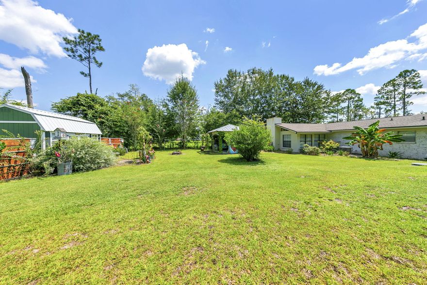 Charming 3BR/2BA Ranch on an Oversized Lot in the Heart of Freeport - No HOA! Discover the warmth and character of this beautifully maintained brick ranch situated on a spacious lot in a quiet, non-HOA neighborhood. Offering 3 bedrooms and 2 full bathrooms, this home blends vintage charm with thoughtful updates, creating a truly inviting and comfortable living space. Step inside to an eclectic, designer-inspired interior featuring updated flooring, fresh paint, and an abundance of natural light. The cozy living room is anchored by large windows and stylish finishes, creating the perfect gathering spot. The adjacent dining area flows effortlessly into the kitchen, where two-tone cabinetry, modern appliances, and rustic accents add personality and function. The primary suite offers generous space and a bright, airy feel, while two additional bedrooms provide flexibility for guests, family, or a home office. Both bathrooms have been updated with clean, modern tilework and fresh fixtures. Outdoor living shines here - enjoy a charming covered front porch, mature landscaping, and a spacious screened-in patio that overlooks the spacious yard. An outdoor pavilion is perfect for backyard barbeques and entertaining and hosting friends. With plenty of room for gardening, entertaining, or future expansion, the oversized lot provides endless possibilities. Located just minutes from schools, parks, shopping, and the bay, this property delivers the freedom of no HOA plus the comfort of a well-loved home.