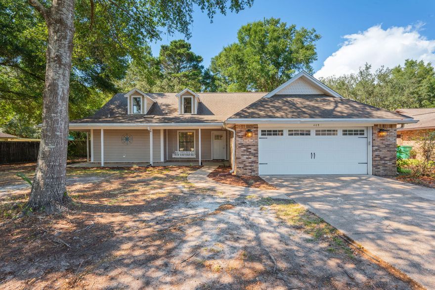 Welcome home to 409 Bimini Way, situated on a generously-sized 0.39 acre lot in the heart of Bluewater Bay. A traditional wrap around front porch begs time to slow down enough to enjoy life along the quiet residential street. Inside, discover a thoughtfully laid out floor plan that maximizes just under 1900 square feet of living space including 4 bedrooms and 3 full baths as well as an open concept kitchen, dining, and living space. Enjoy recent updates to the kitchen, all three bathrooms, and main level flooring, doors, and trim. A screened porch leads to the spacious backyard featuring abundant open space ripe with possibilities for recreation and relaxation. Newer HVAC (2019) and water heater (2020) add peace of mind, and roof will be replaced prior to closing with an acceptable offer. Act now to secure this gem! Conveniently located less than half a mile from shopping and dining at Merchant's Walk as well as all of Bluewater Bay's recreational options (marina complex, miles of walking trails, plus available memberships for golf, pickleball, tennis, and pools). Jump on the Mid Bay Bridge and take advantage of all that Destin and South Walton have to offer! Zoned for prized Bluewater Elementary School, a choice of desirable Middle Schools (Ruckel or Destin), and highly rated Niceville High School. 