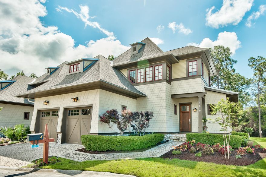 For those with impeccable taste and design paired with low maintenance, this beautiful villa in The Courts at Wild Heron is immaculate and move-in ready. The handsome exterior blends natural elements like river rock and Hardie siding with the enchanting coastal craftsman style architect Dungan Nequette is known for. The open living space includes a fireplace with large wall mounted TV above, tall pane windows, hardwood floors and attractive coffered ceiling. Quartz countertops and stainless steel appliances, including a wine refrigerator, anchor a wonderful kitchen and breakfast bar. Entertainment amenities include a custom bar in the living room. Privacy abounds not only in the master suites on each floor, but also the woodland setting that brings nature to your door step. Bathrooms have tile, glass and Kohler accessories. Wonderful screened porches with ipe decking are a great place to relax and enjoy nature. Everything has been thoughtfully designed for a casually-elegant lifestyle, along with conveniences like the 2-car garage, laundry, and storage room. 

Ideally located just minutes from the beautiful beaches, Inlet Beach, Rosemary Beach, and the quaint shopping and dining at 30Avenue as well as Pier Park, this property is quintessential for those who desire privacy yet still want the convenient location of Wild Heron.

Wild Heron is a 734 acre award winning planned community located on the shores of Lake Powell, a rare coastal dune lake. Residents of Wild Heron enjoy world-class amenities including a lake view swimming heated pool & hot tub, fitness center, lakeside boardwalk, and a family park.  The lakefront boathouse is stocked with kayaks and canoes to enjoy one of Florida's largest coastal dune lakes.  A series of walkways and nature paths link the amenities for everyone to enjoy.  Wild Heron is home to the Greg Norman designed Sharks Tooth Golf Course and tennis courts.