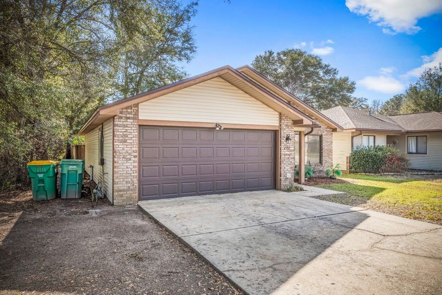 Make this immaculate home in Cedar Ridge yours!  Enjoy the new LVP flooring throughout the main living areas, and a renovated garage to add more living space to the home. The light and airy living/dining room has vaulted ceilings and a pass through to the kitchen which features new stainless steel appliances and a sliding door to access the rear open patio and lovely backyard. The converted garage space was used by the sellers as a large office/family room but also has a closet and window so could be a third bedroom if desired. The interior laundry room is also accessed from this area. The master bedroom features an en suite bath and will accommodate a king size bed. The fully fenced backyard is very private and has multiple palm trees giving it a tropical feel. Roof is 2017, HVAC 2018 and