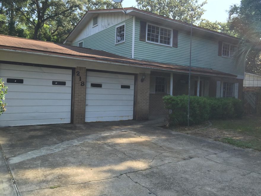 REO. Great family area with large lots and mature trees. Hardwood floors in the oversized bedrooms. The Master Bedroom has a dressing area with his and her closets and build in drawers for storage. Master Bath with tub is separate from dressing area. Large Brick Florida Room has a Fireplace. There also is a screened porch. Seller has just installed an BRAND NEW HVAC system and NEW HOT WATER HEATER! Oversized Double Garage. This is a Fannie Mae HomePath property.